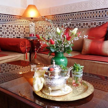 Riad Viva Marrakesh Exterior photo A Moroccan tea set