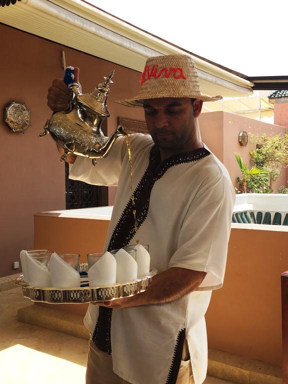 Riad Viva Marrakesh Exterior photo Moroccan coffee being served