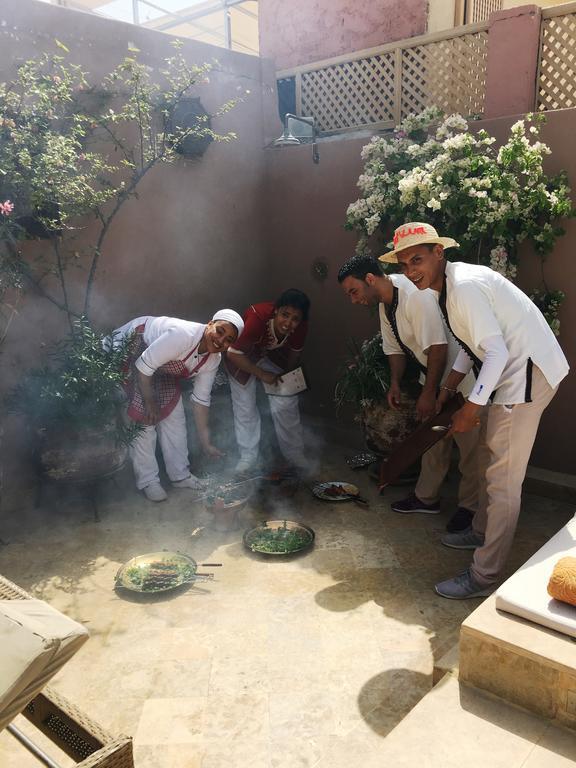 Riad Viva Marrakesh Exterior photo A ritual of the Ifa divination system